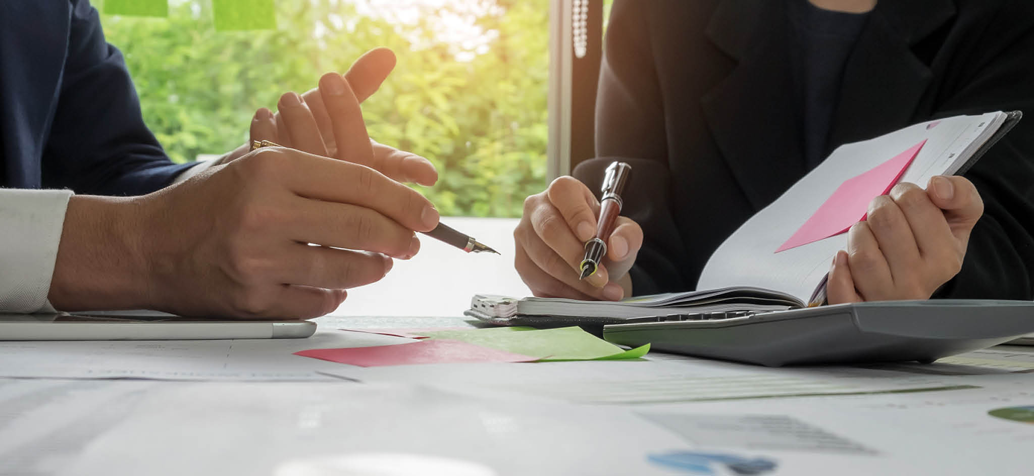 Business concepts,Management is executing the secretary is taking notes.Document placed on the desk.