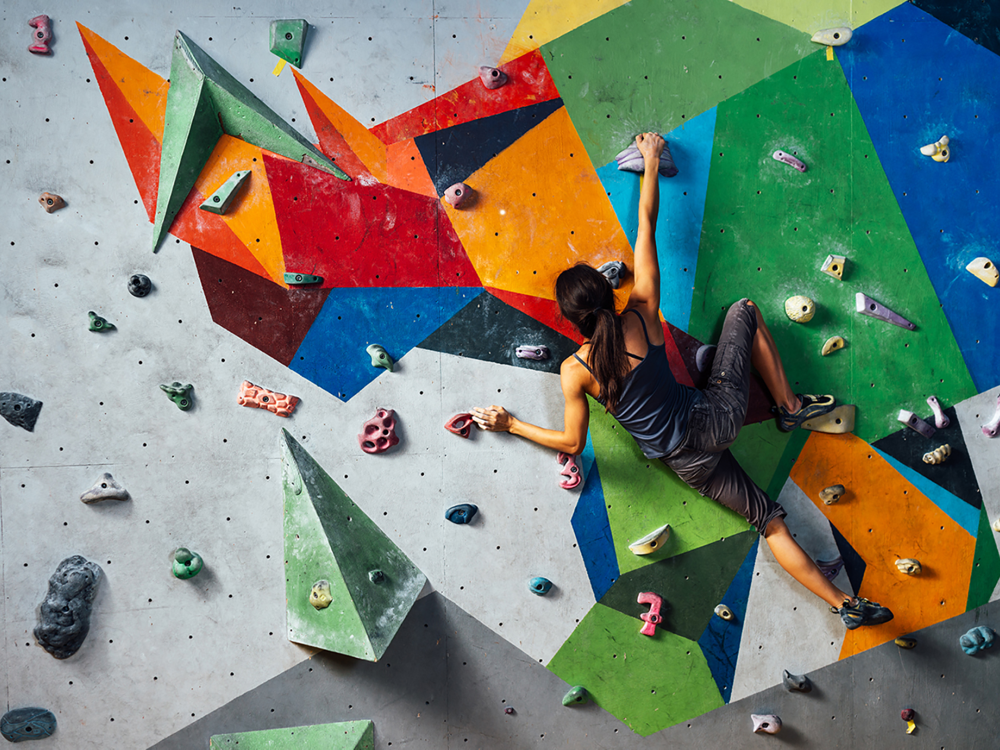 girl is climbing in the training room