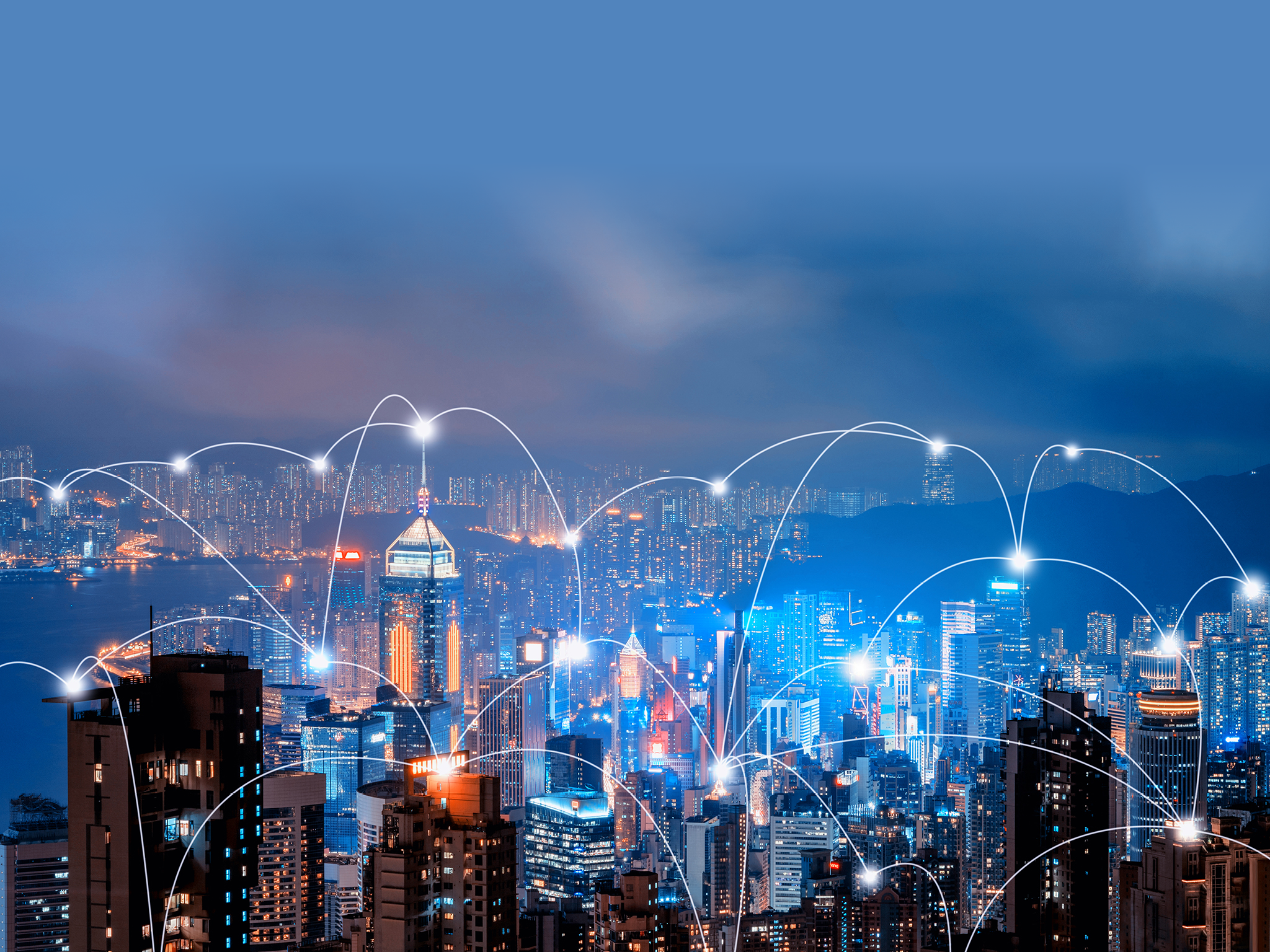 Digital network connection lines of Hong Kong Downtown and Victoria Harbour. Financial district in smart city in technology concept. Skyscraper and high-rise buildings. Aerial view at night.