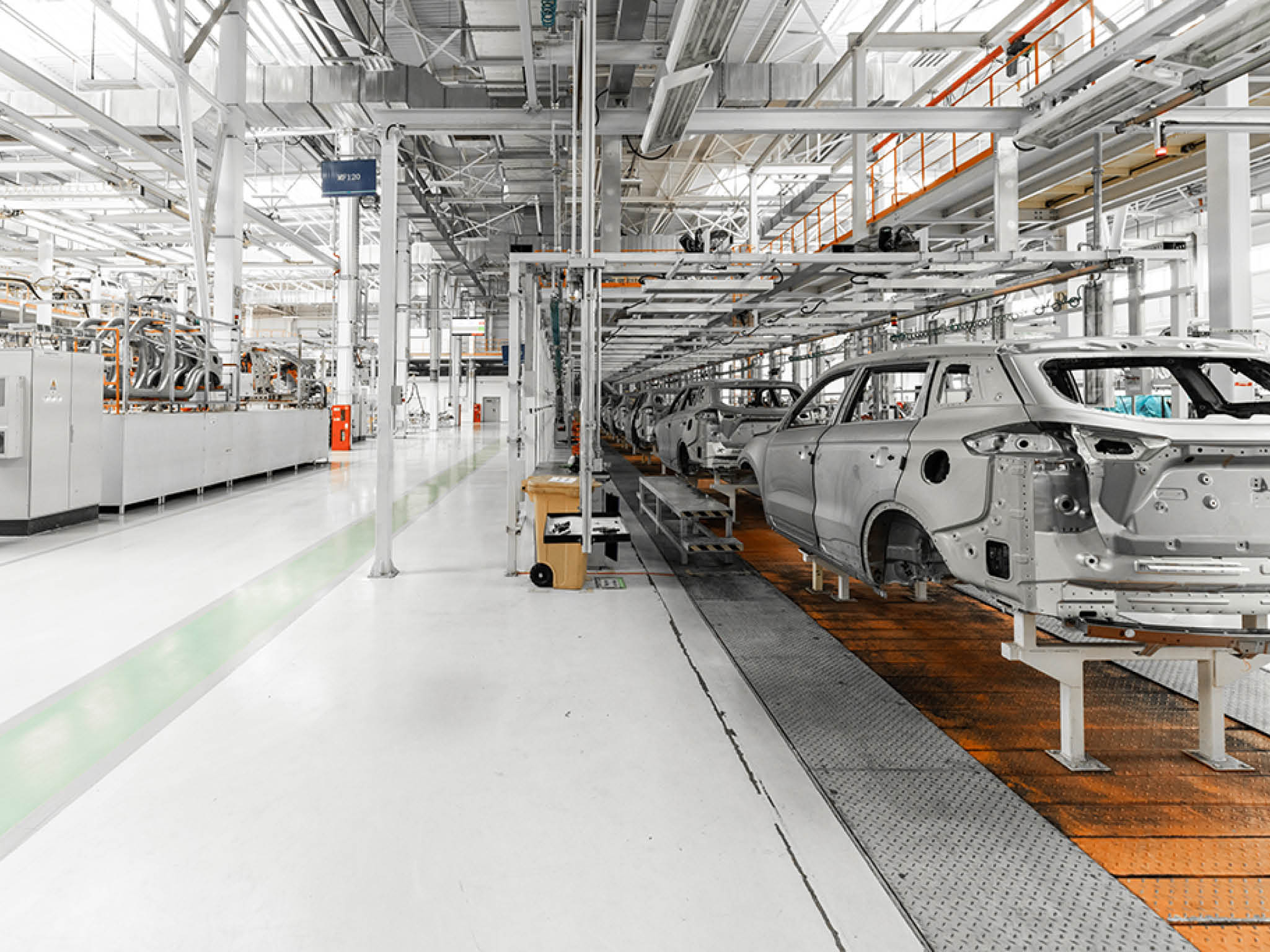 Plant for production of cars. Modern automotive industry. Electric car factory, conveyor.