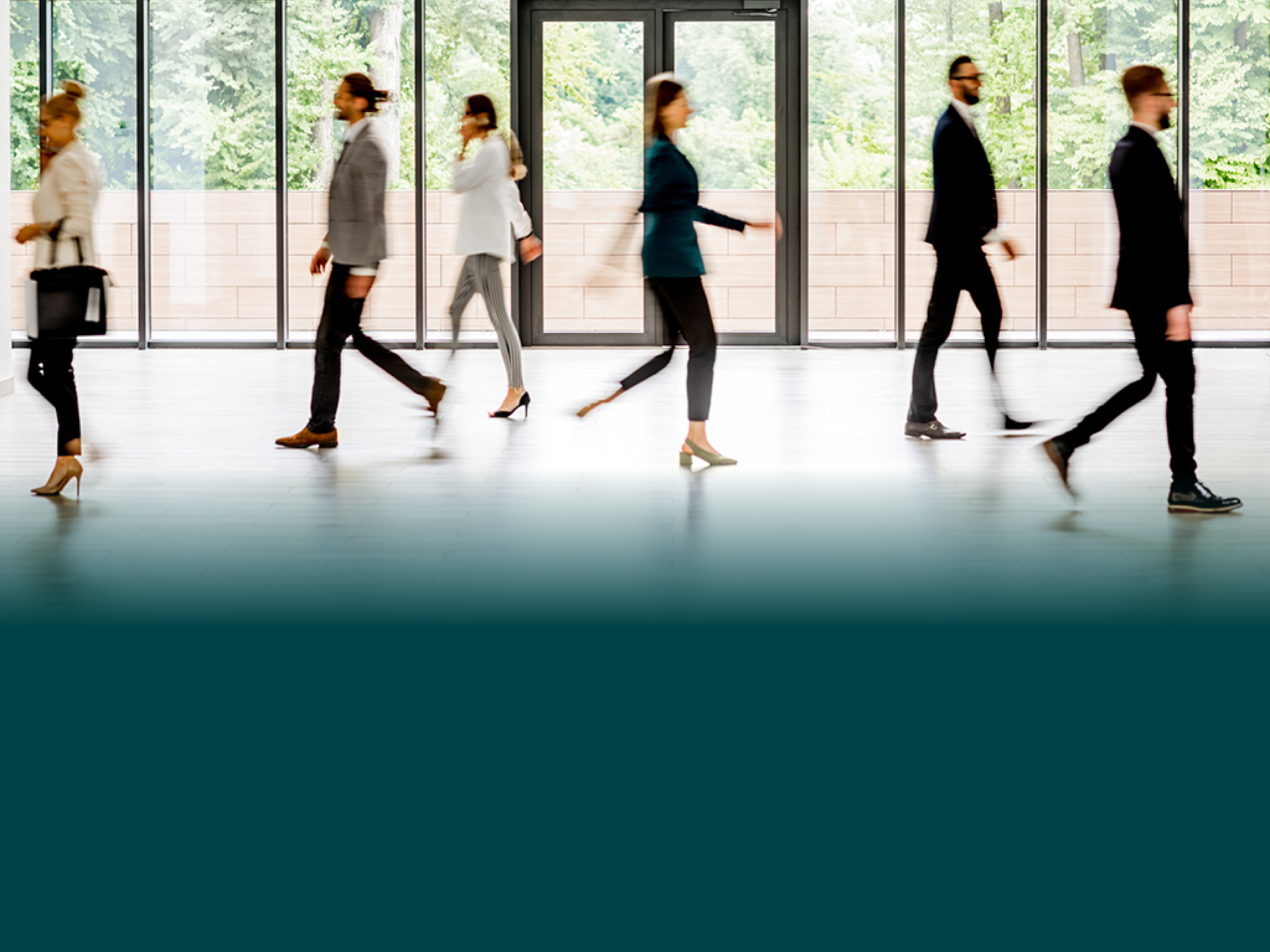 Business people walking at the modern hall on the window background indoors. long exposure image technic with motion blurred people